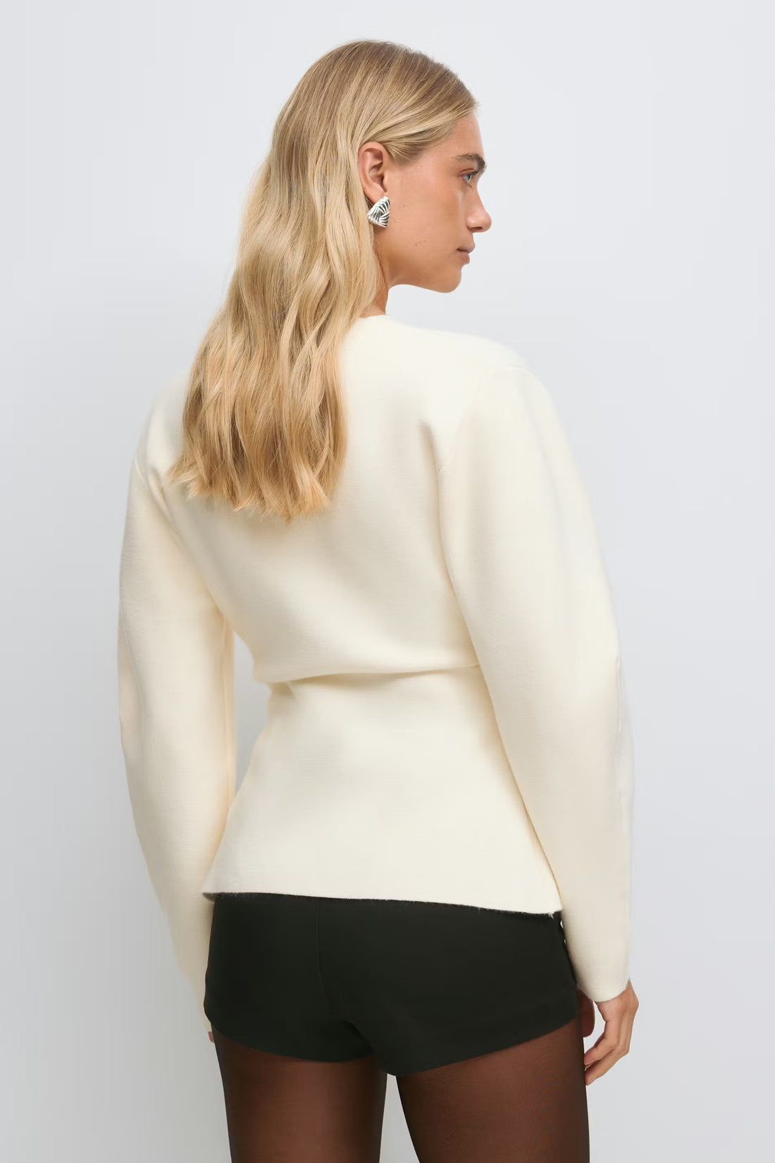 Shaped knitted cardigan